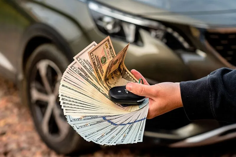 Stack of dollar bills and euro banknotes